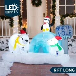 6ft Inflatable LED North Pole With Polar Bears -Christmas Decorations Store 6ft Inflatable LED North Pole with Polar Bears 2 600x600 1