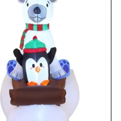 6ft Inflatable LED Polar Bear Sledding With A Penguin -Christmas Decorations Store 6ft Inflatable LED Polar Bear Sledding with a Penguin 3 result 600x822 1