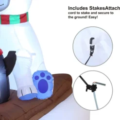 6ft Inflatable LED Polar Bear Sledding With A Penguin -Christmas Decorations Store 6ft Inflatable LED Polar Bear Sledding with a Penguin 6 result 600x609 1