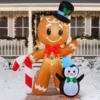 6ft Tall LED Gingerbread With Penguin Decoration 1 6ft Tall LED Gingerbread With Penguin Decoration -Christmas Decorations Store 6ft Tall LED Gingerbread with Penguin Decoration 8 600x600 1
