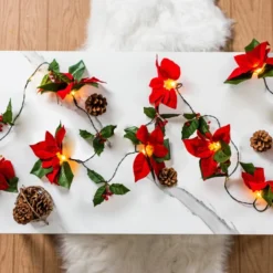 Pre Lit Velvet Silk Poinsettia Garland With Red Berries 6ft -Christmas Decorations Store Pre Lit Velvet Silk Poinsettia Garland with Red Berries 6ft 5 result 600x600 1