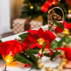 Pre Lit Velvet Silk Poinsettia Garland With Red Berries 6ft -Christmas Decorations Store Pre Lit Velvet Silk Poinsettia Garland with Red Berries 6ft 6 result 600x600 1